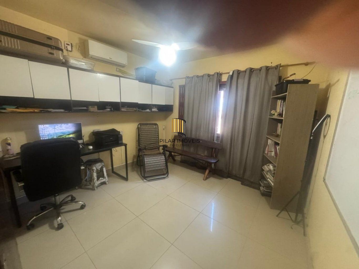 Casa de 5 dormitórios e 4 vagas de garagem em Canoas.