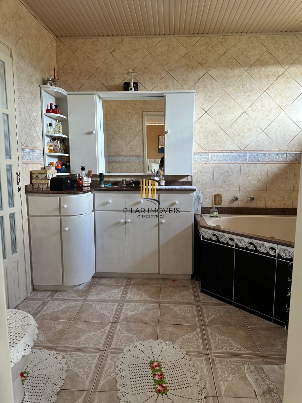 Casa com 3 quartos e 220m² à venda em Parque Santa Fé, Porto Alegre.