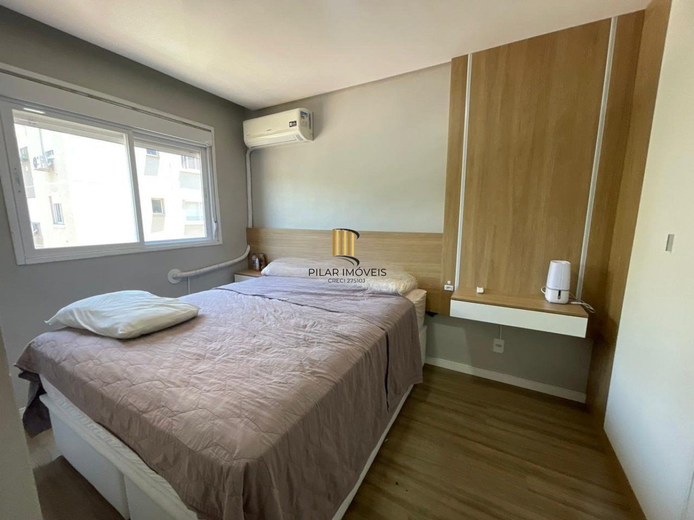 Apartamento de 2 dormitórios, elevador e 1 vaga de garagem em Canoas.