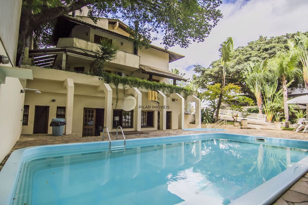 Casa em Condomínio com 5 quartos e 390m² à venda em Boa Vista, Porto Alegre.
