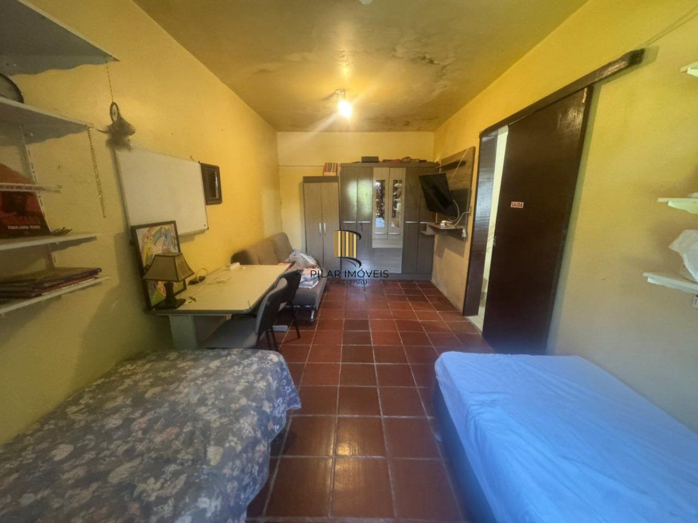 Casa de 5 dormitórios e 4 vagas de garagem em Canoas.