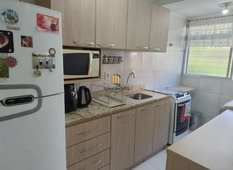 Apartamento de 2 dormitórios com 1 vaga de garagem no bairro Passo da Areia