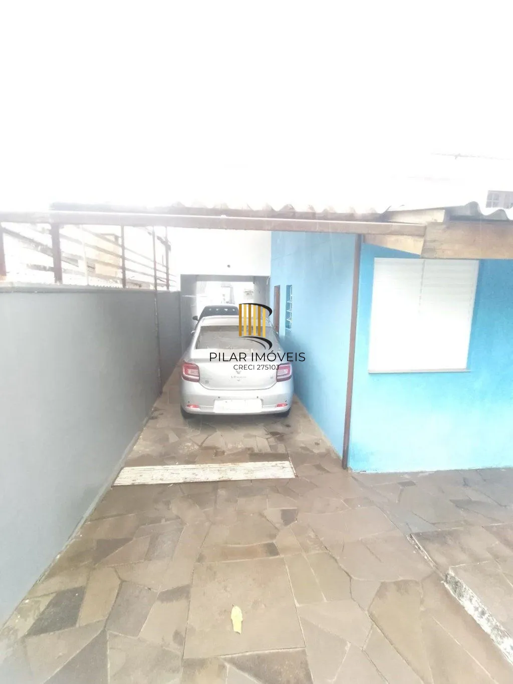 Casa de 5 dormitórios, piscina e 4 vagas de garagem em Canoas.