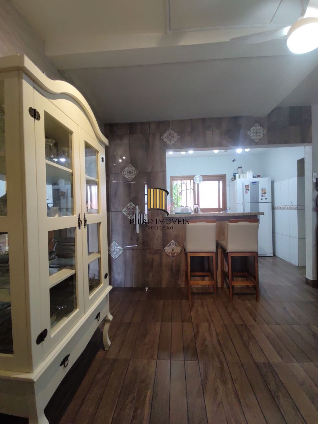 Casa de 3 dormitórios e 2 vagas de garagem em Cachoerinha.