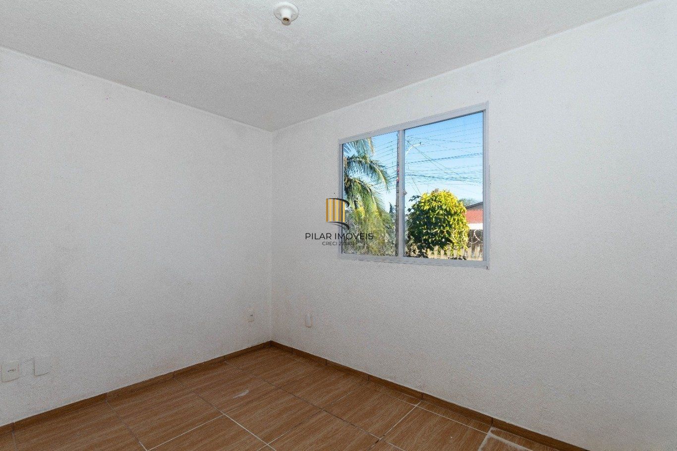 Apartamento com 2 dormitórios, e 1 vaga no bairro Estancia Velha em Canoas.