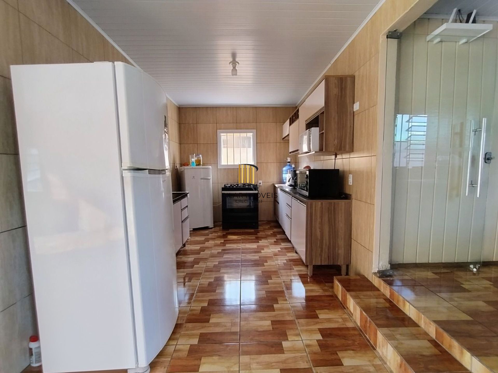 Casa de 4 dormitórios e 4 vagas de garagem em Canoas.