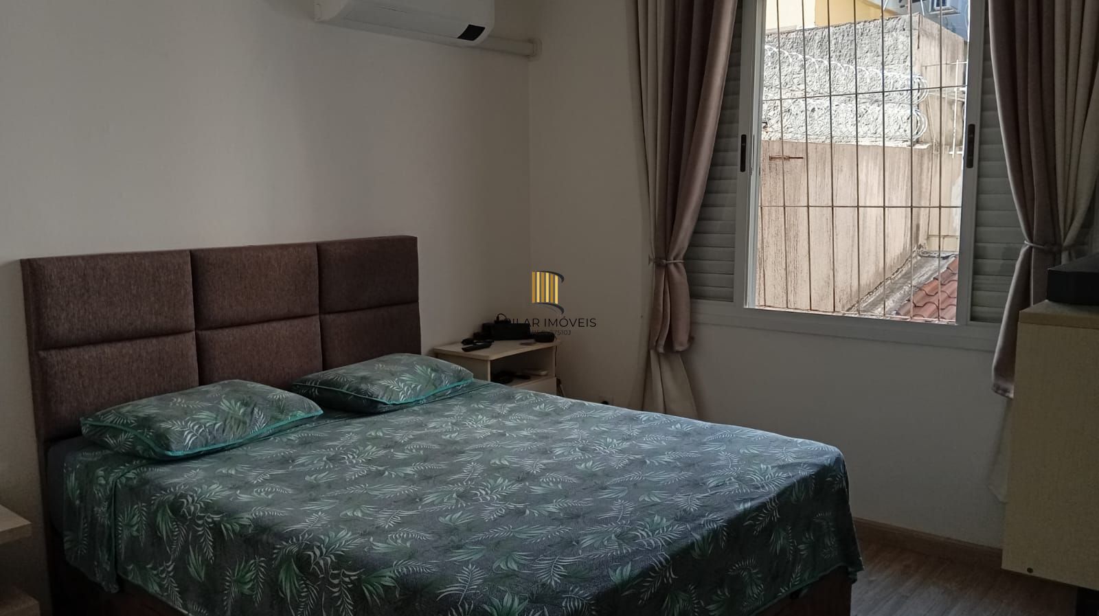 Apartamento térreo com 3 dormitórios e 2 vagas no Bairro Cristo Redentor