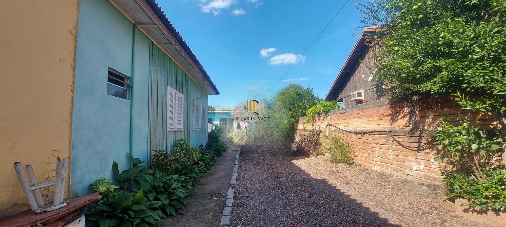 Imóvel com 2 moradias e ponto comercial em Alvorada