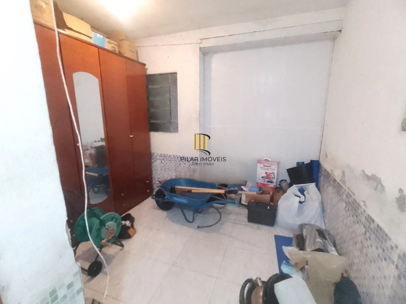 Casa de 5 dormitórios, piscina e 4 vagas de garagem em Canoas.