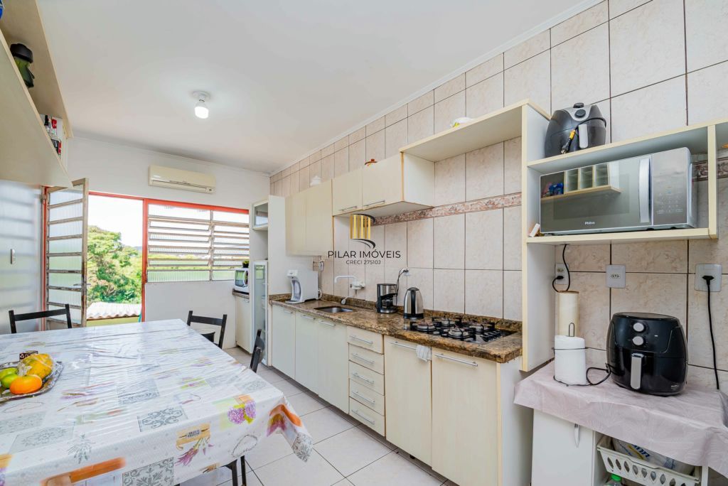 Casa com 3 quartos e 4 vagas à venda em Vila Nova