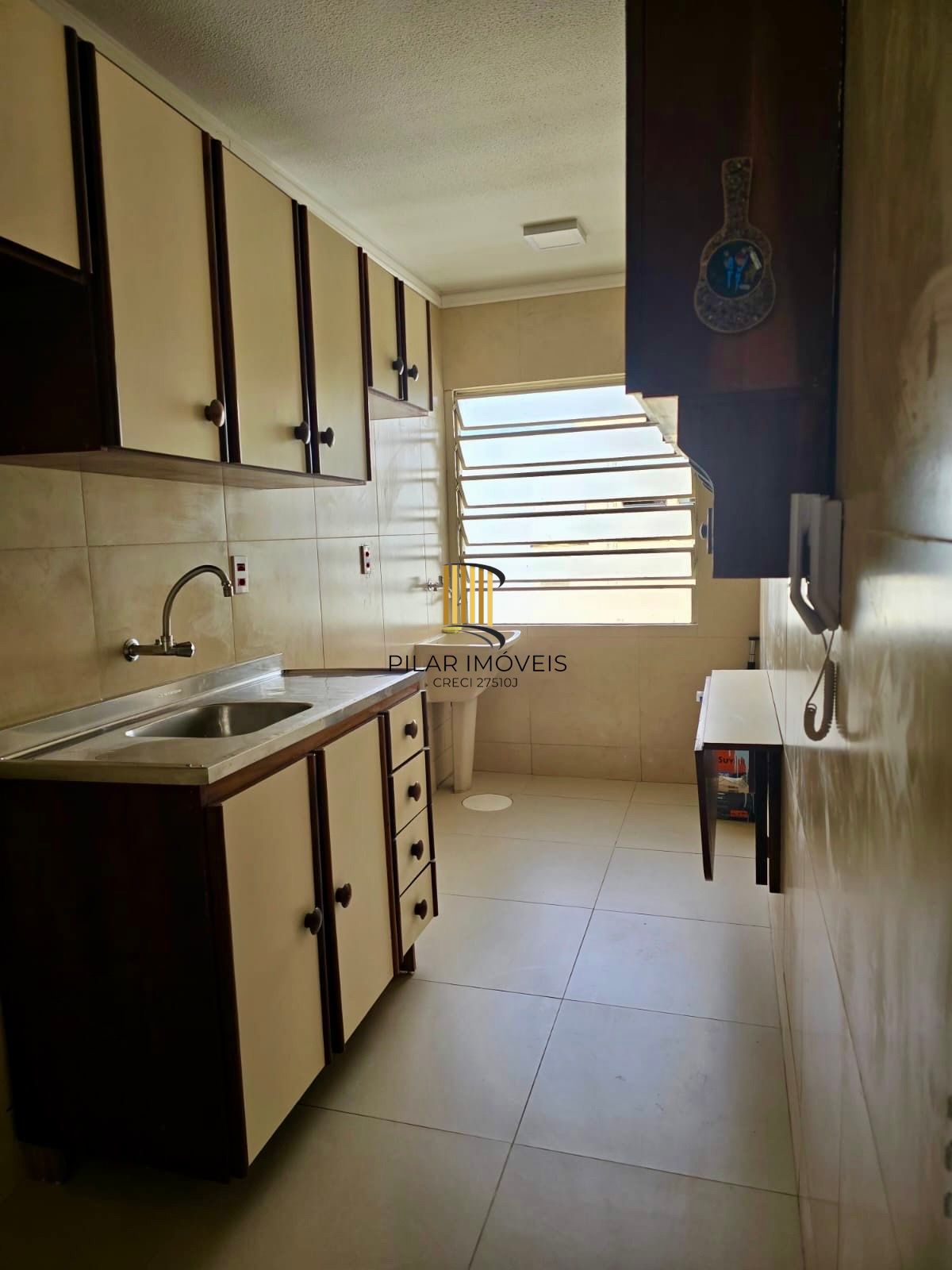 Apartamento de 2 dormitórios, 1 vaga, elevador no bairro Sarandi