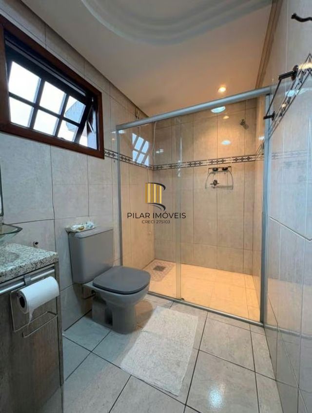 Casa de 3 dormitórios e 1 vaga de garagem em cachoeirinha.