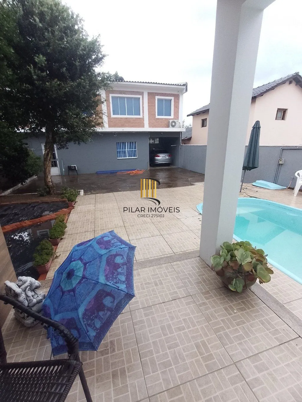 Casa de 5 dormitórios, piscina e 4 vagas de garagem em Canoas.
