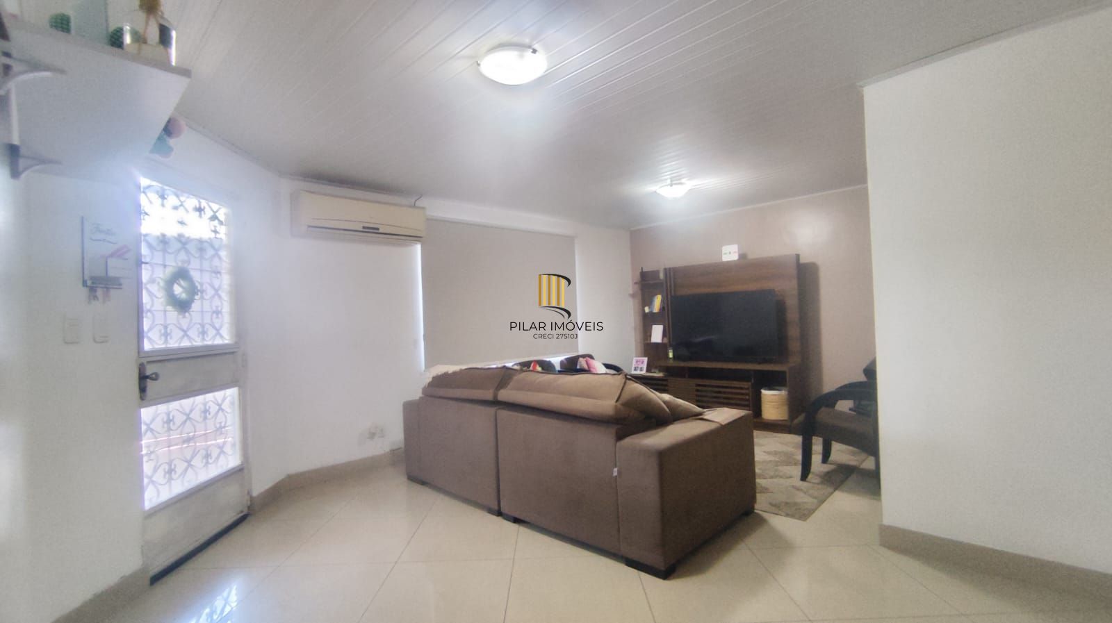 Casa térrea de 3 quartos, suíte, 3 vagas no bairro Santa Fé