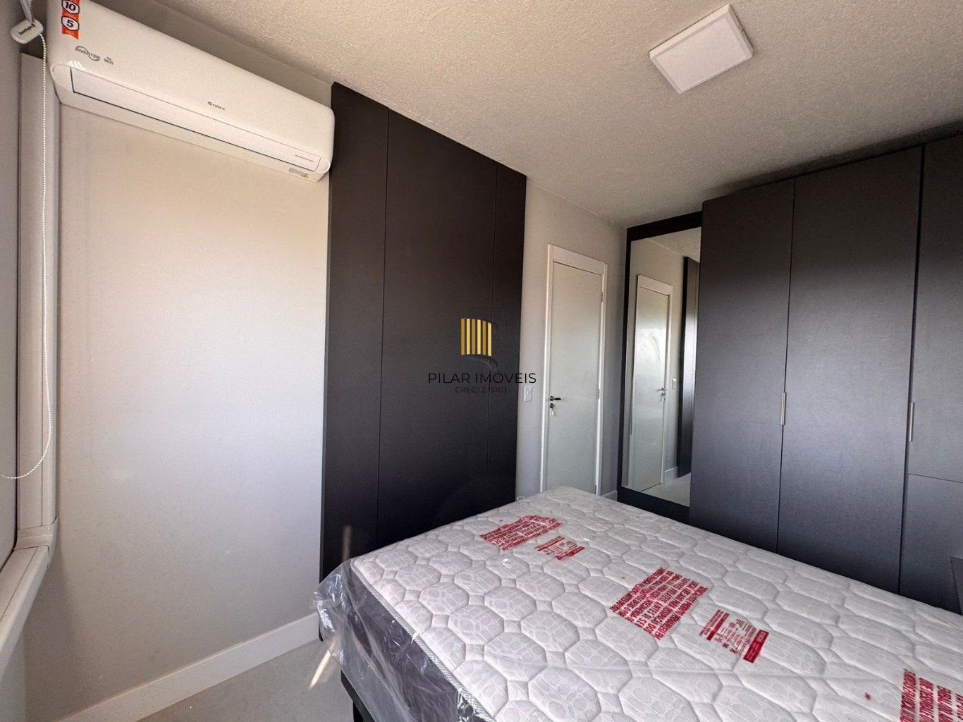 Apartamento de 2 dormitórios, elevador e 1 vaga de garagem em Canoas.