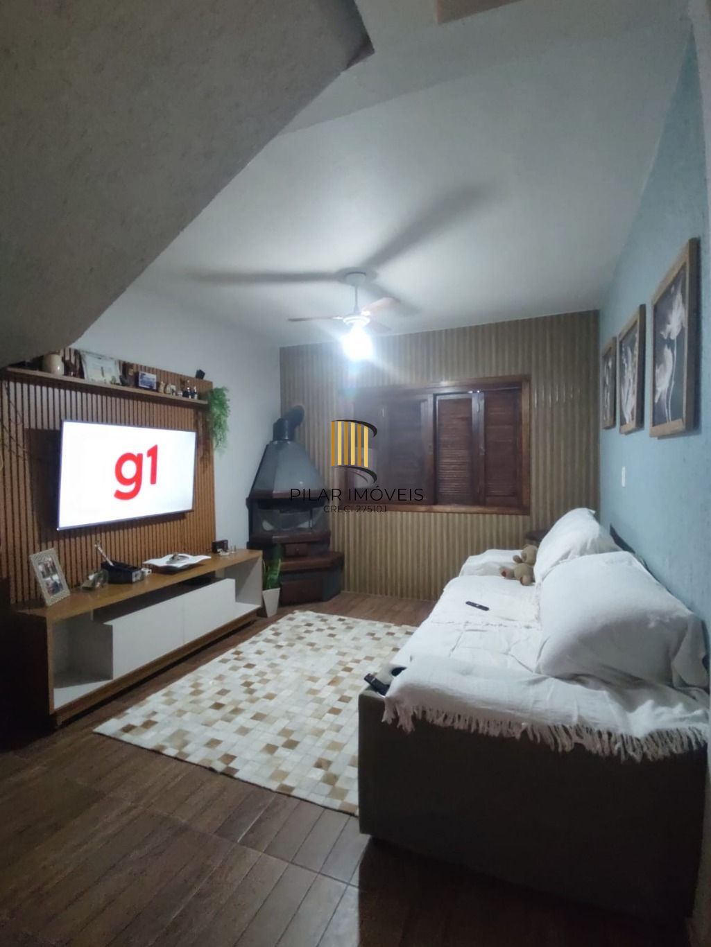 Casa de 3 dormitórios e 2 vagas de garagem em Cachoerinha.