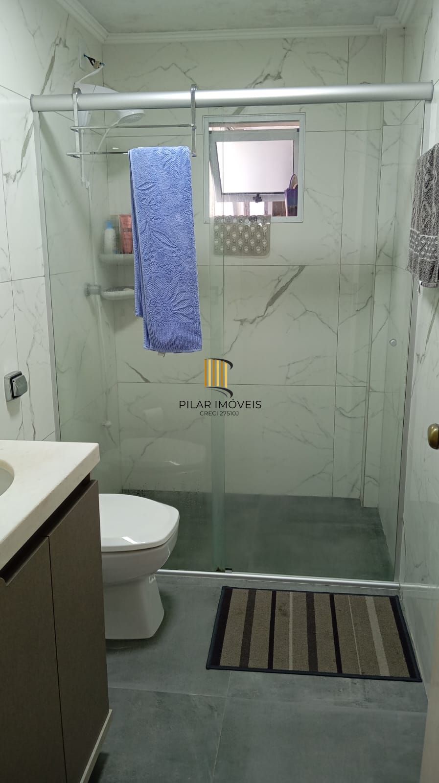 Apartamento térreo com 3 dormitórios e 2 vagas no Bairro Cristo Redentor