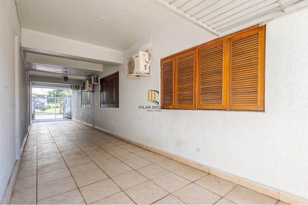 Casa com 4 quartos, 7 vagas e pátio no Bairro Higienópolis