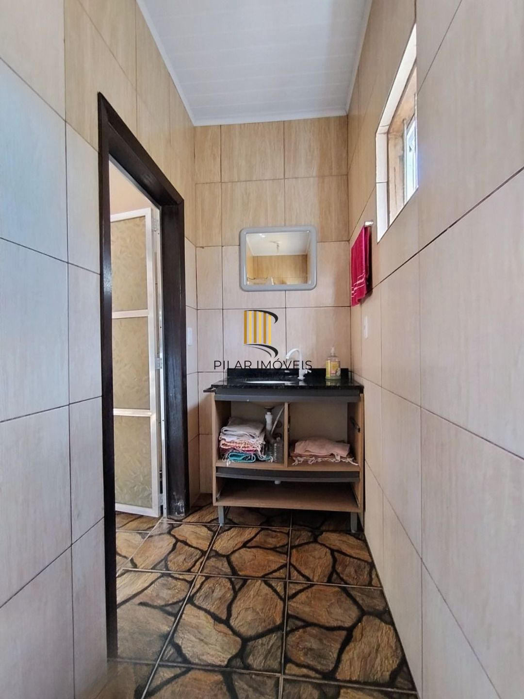 Casa de 4 dormitórios e 4 vagas de garagem em Canoas.