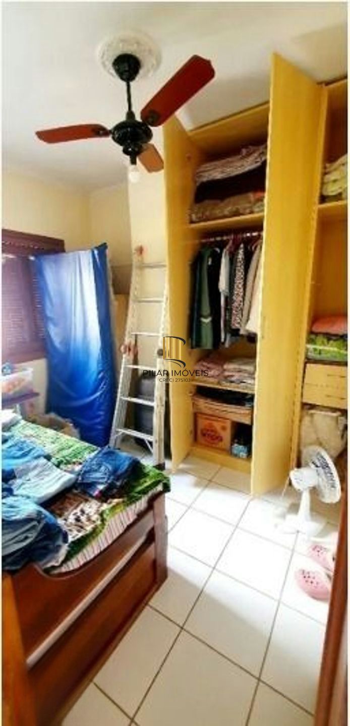 Casa com 5 quartos, piscina e 3 vagas de garagem em Canoas.