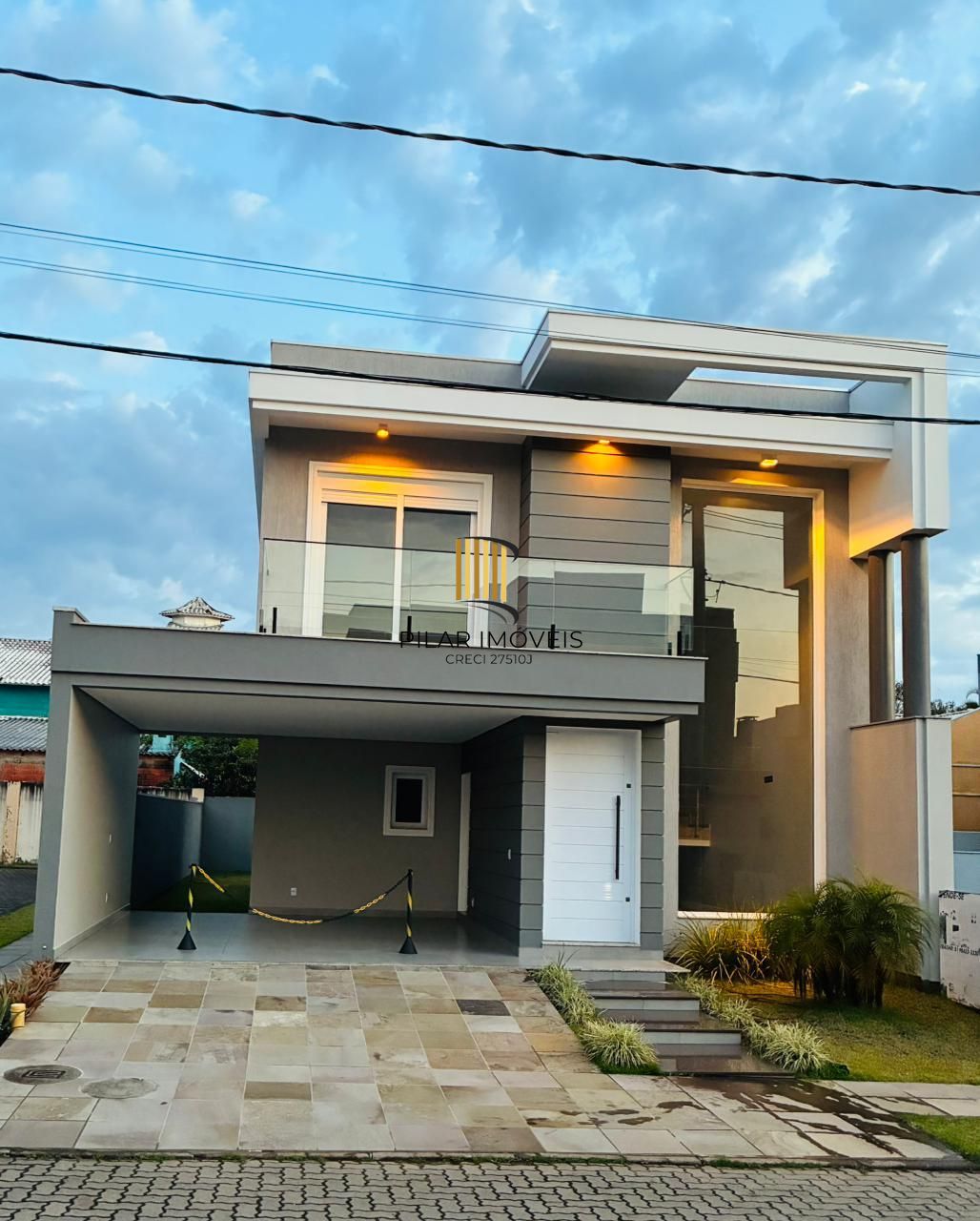 Casa em condomínio Las Brisas, 3 suítes e 2 vagas de garagem em Canoas