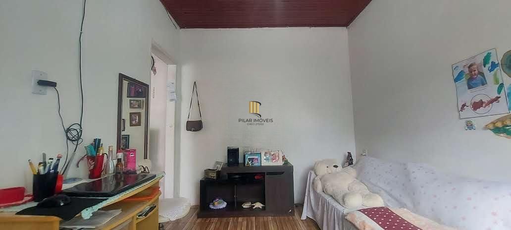 Imóvel com 2 moradias e ponto comercial em Alvorada