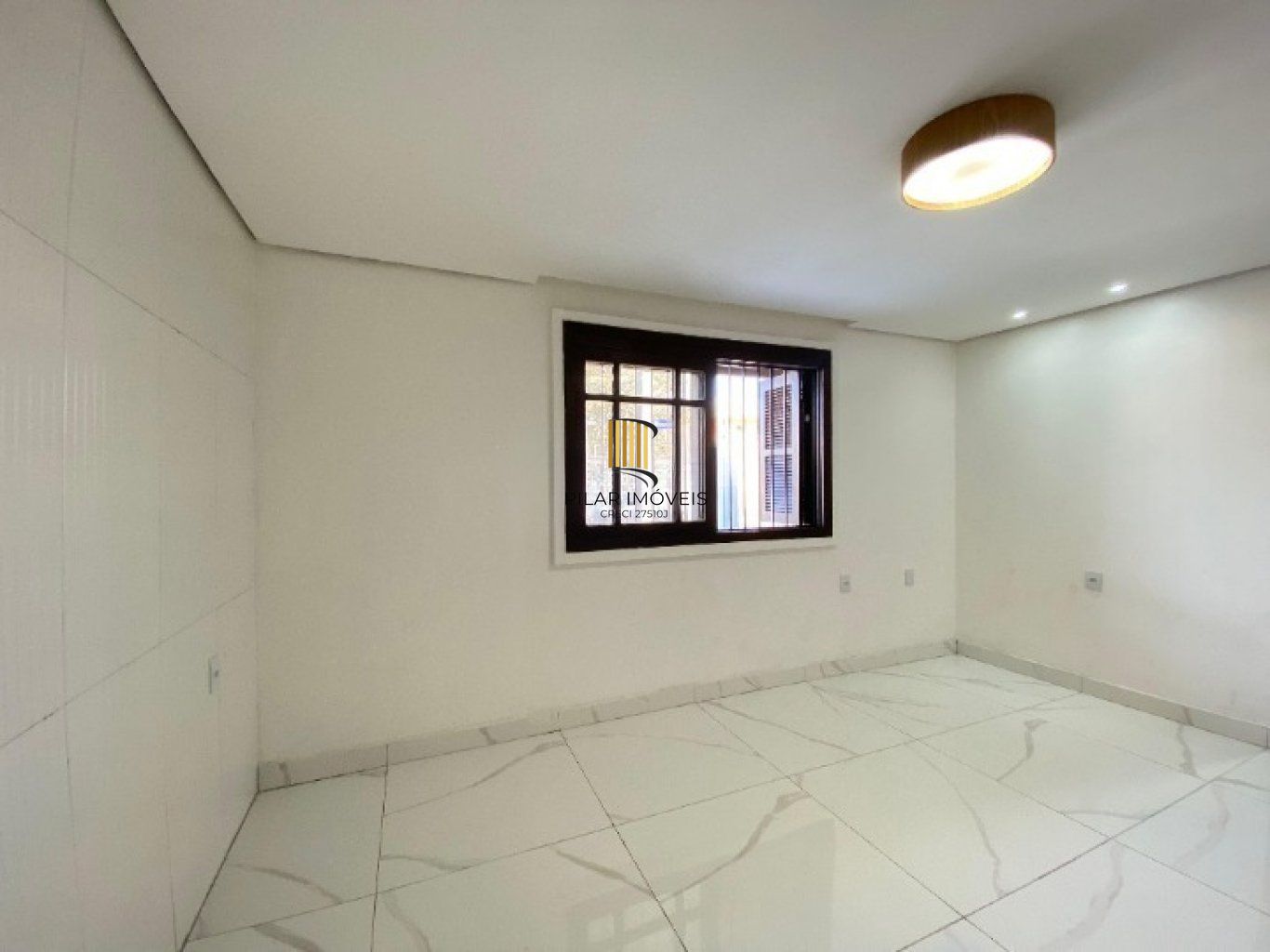 Casa com 3 Dormiórios, 2 vagas de garagem no bairro Harmonia em  Canoas.