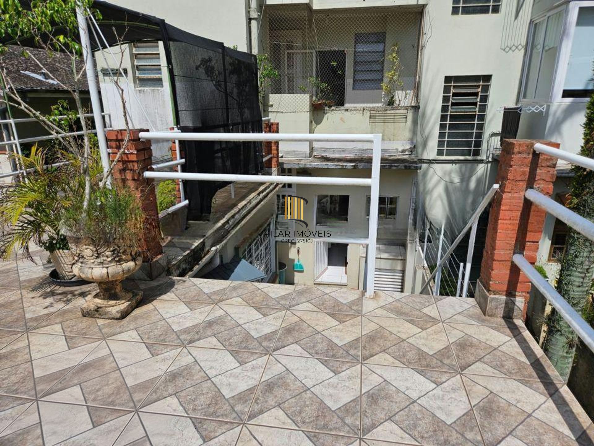 Apartamento com 2 dormitórios e 69m² de área privativa no Bairro Auxiliadora