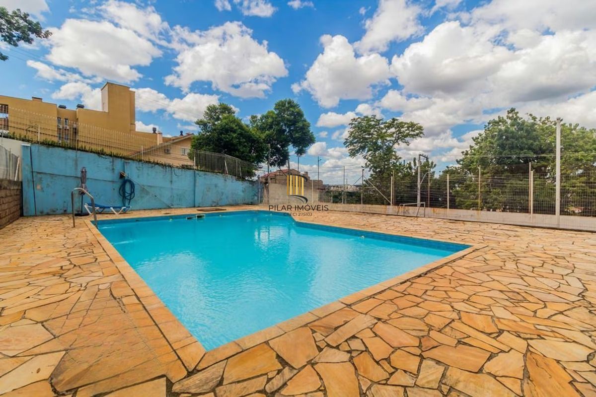 Casa em condomínio 4 dormitórios com piscina e energia solar no Santo Antonio