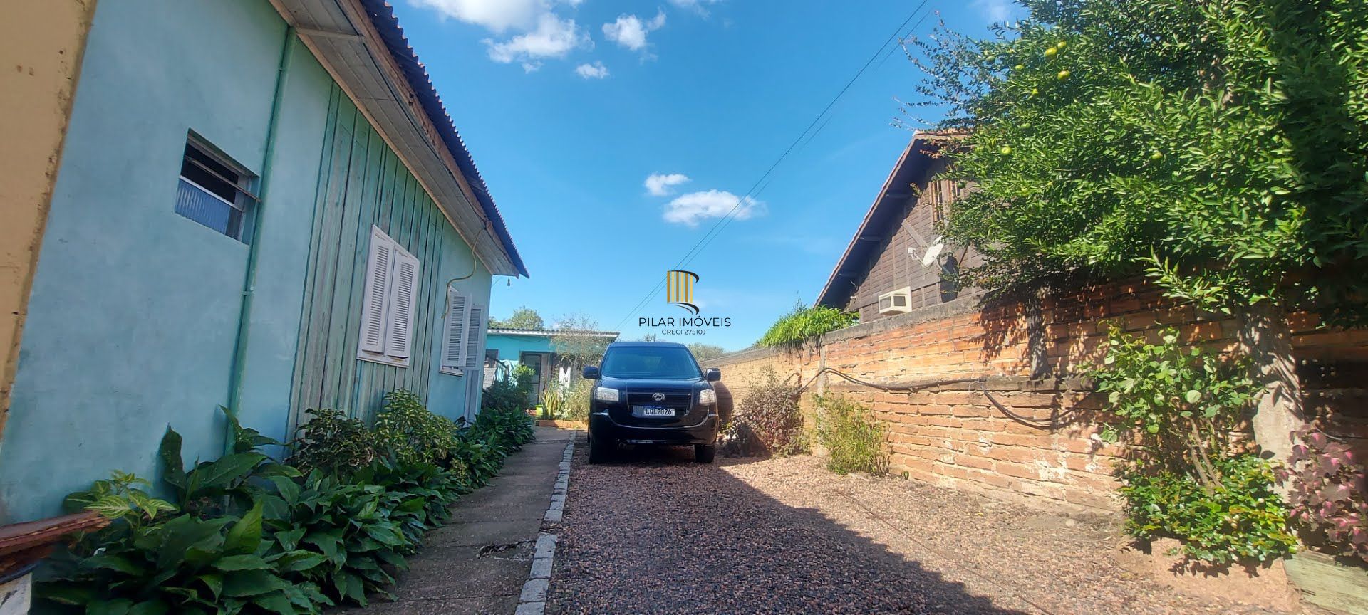 Imóvel com 2 moradias e ponto comercial em Alvorada