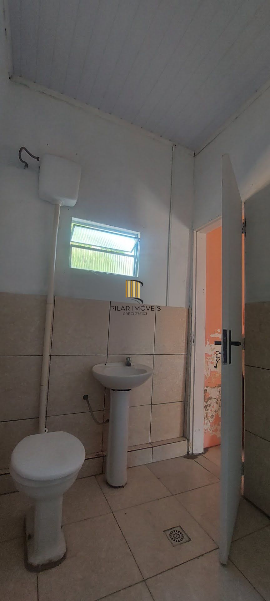 Imóvel com 2 moradias e ponto comercial em Alvorada