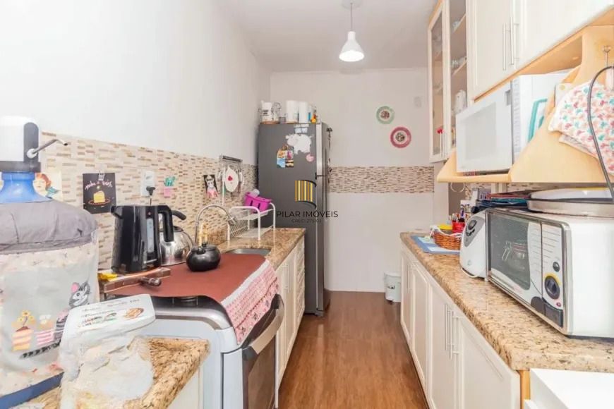 Apartamento com 2 quartos e 58m² à venda em Passo da Areia, Porto Alegre.