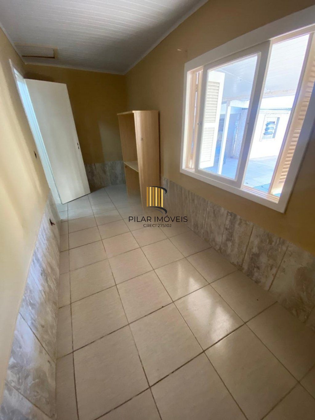 Casa de 2 dormitórios e 2 vaga de garagem em Vila Eunice Cachoeirinha.