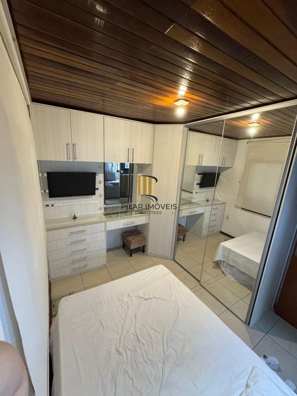 Casa de 4 dormitórios e 2 vagas de garagem no Bairro Monte Carlos Cachoeirinha.