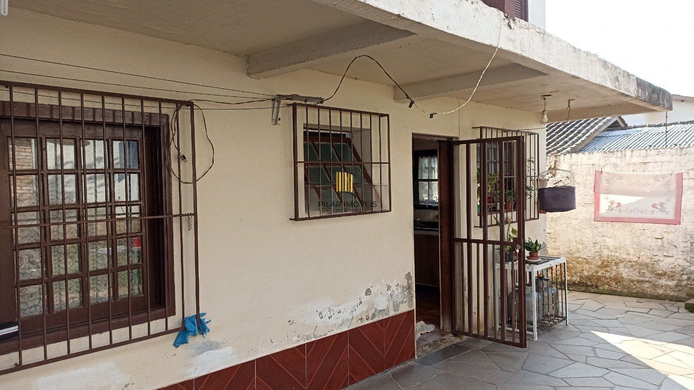 Casa de 3 dormitórios bairro Santa Fé