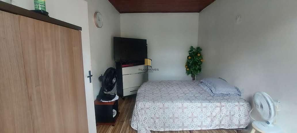 Imóvel com 2 moradias e ponto comercial em Alvorada