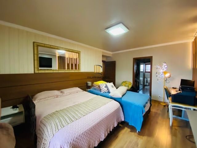 Casa de 3 dormitórios, elevador e 3 vagas de garagem em Canoas.