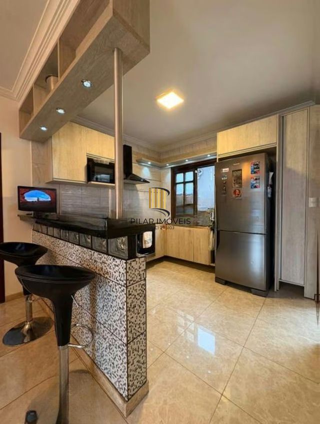 Casa de 3 dormitórios e 1 vaga de garagem em cachoeirinha.