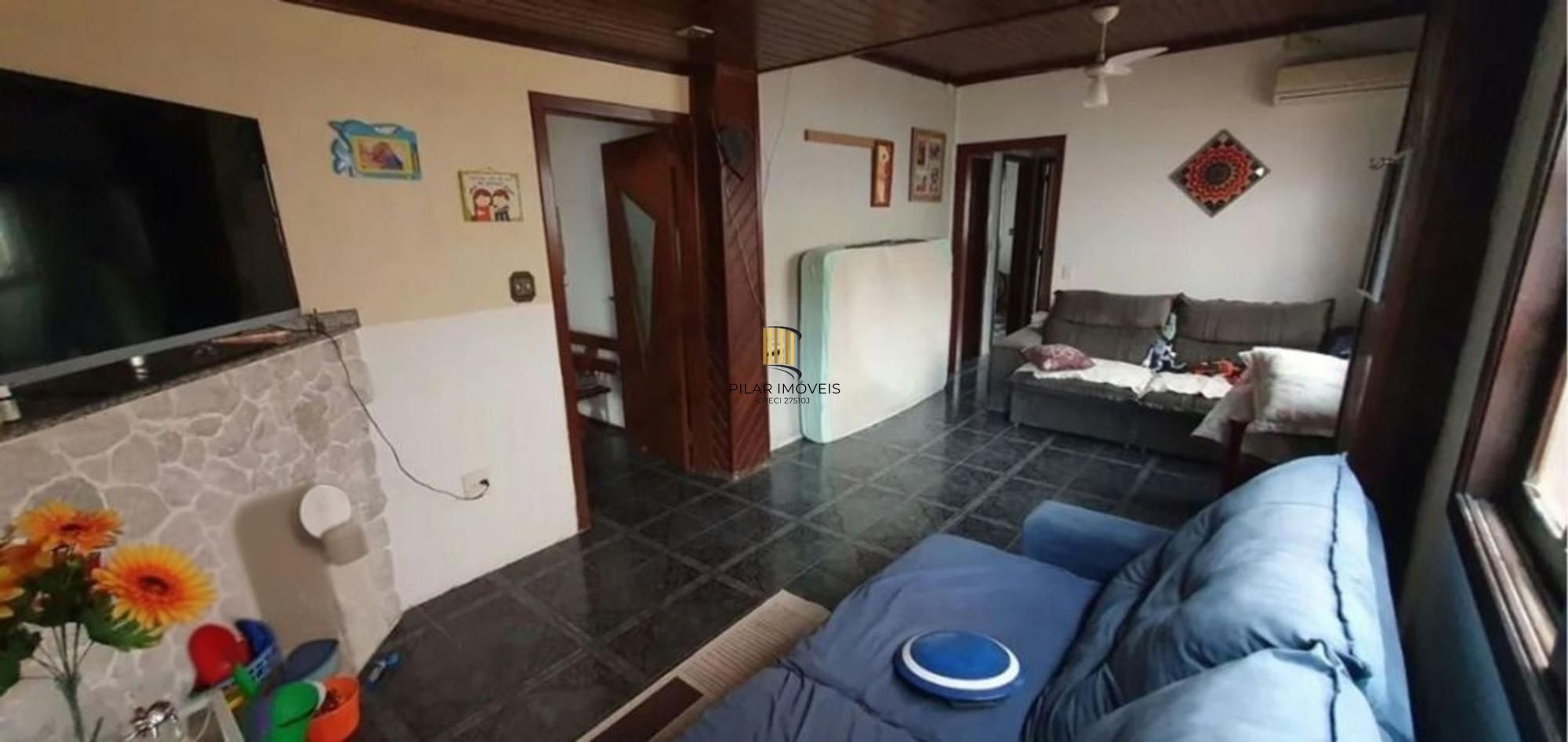 Casa com 5 quartos, piscina e 3 vagas de garagem em Canoas.