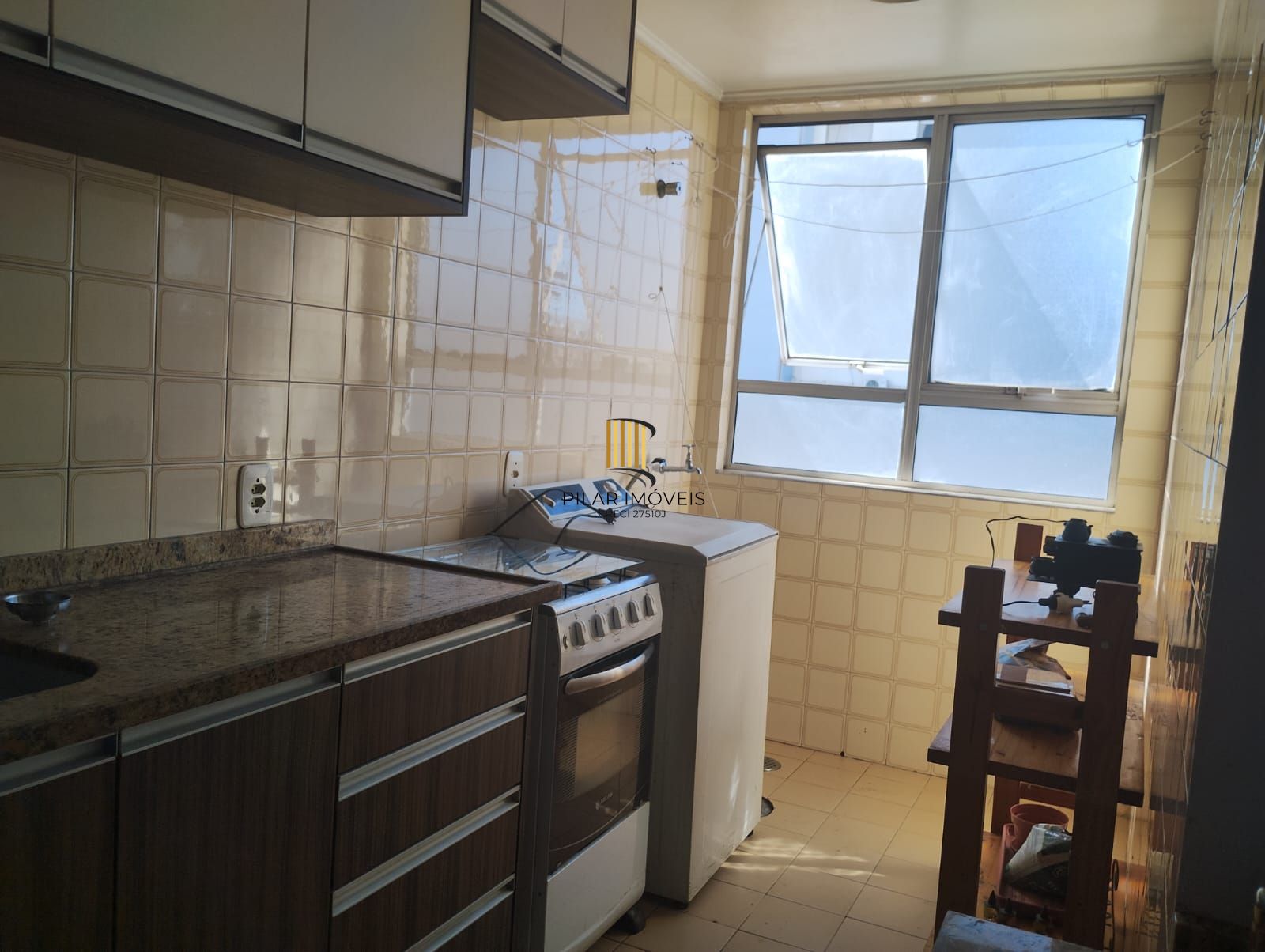 Apartamento de 1 quarto, elevador, 1 vaga coberta no bairro Partenon