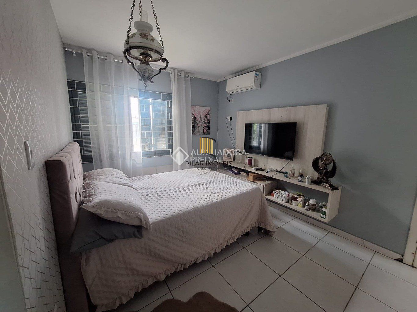 Casa com 2 dormitórios, sendo 1 suíte e 2 vaga de garagem coberta em canoas.