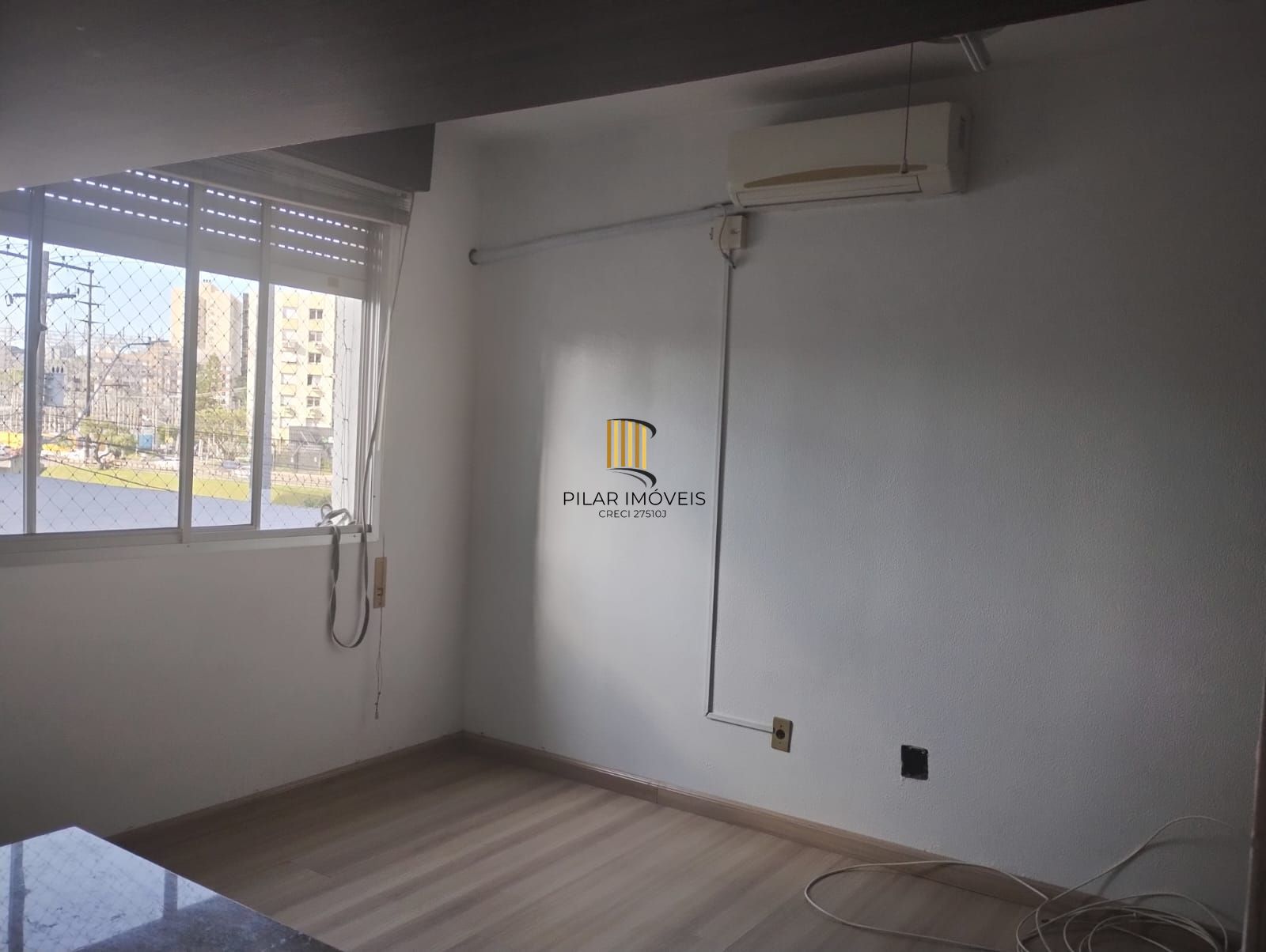 Apartamento de 1 quarto, elevador, 1 vaga coberta no bairro Partenon