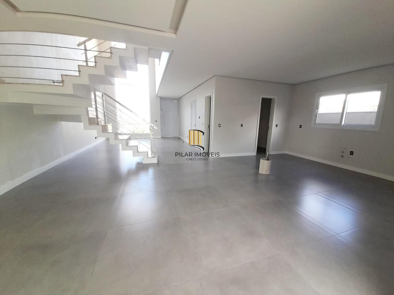 Casa em condomínio Las Brisas, 3 suítes e 2 vagas de garagem em Canoas