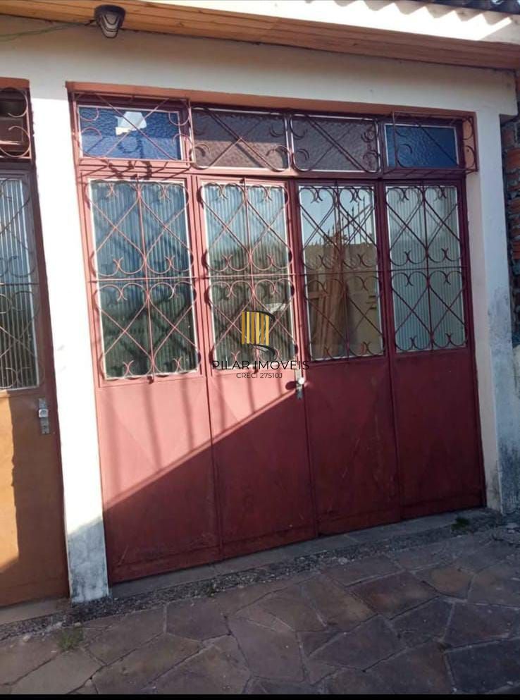 Casa 150m2 com 3 dormitórios e ampla garagem com churrasqueira Bairro Restiga