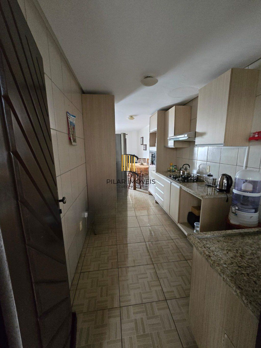 Casa de 3 dormitórios com  uma vaga de garagem no bairro Niterói Canoas.