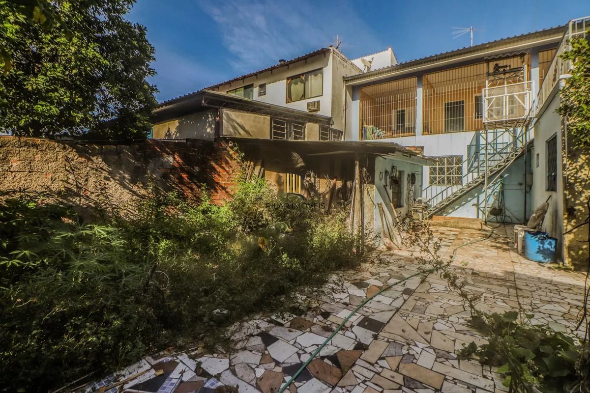 Casa e loja à venda com 300m², 3 quartos e 3 vagas no Rubem Berta