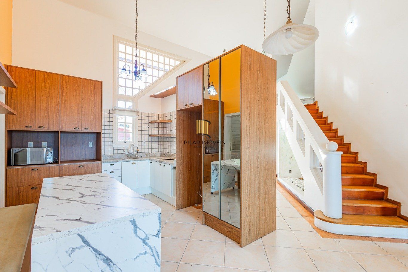 Casa com 3 dormitórios, 2 vagas de garagem no bairro Marechal Rondon em Canoas.