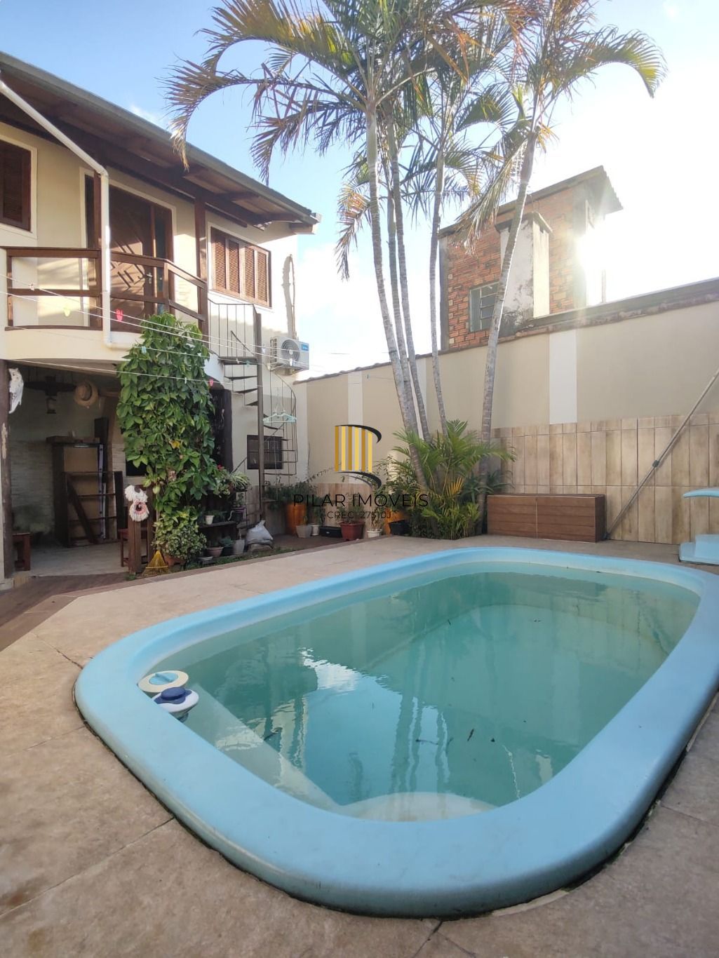 Casa de 3 dormitórios e 2 vagas de garagem em Cachoerinha.