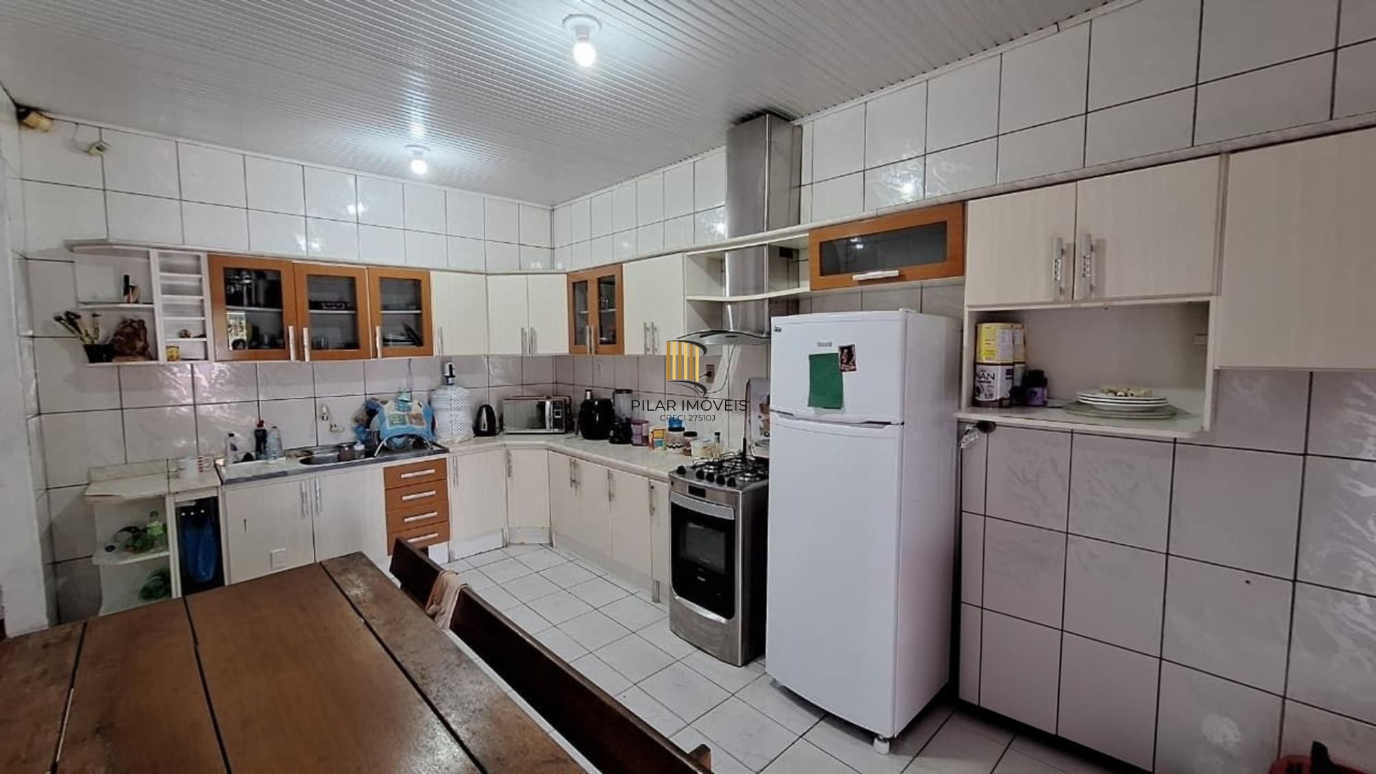 Casa de 4 dormitórios e 4 vagas de garagem em Canoas.