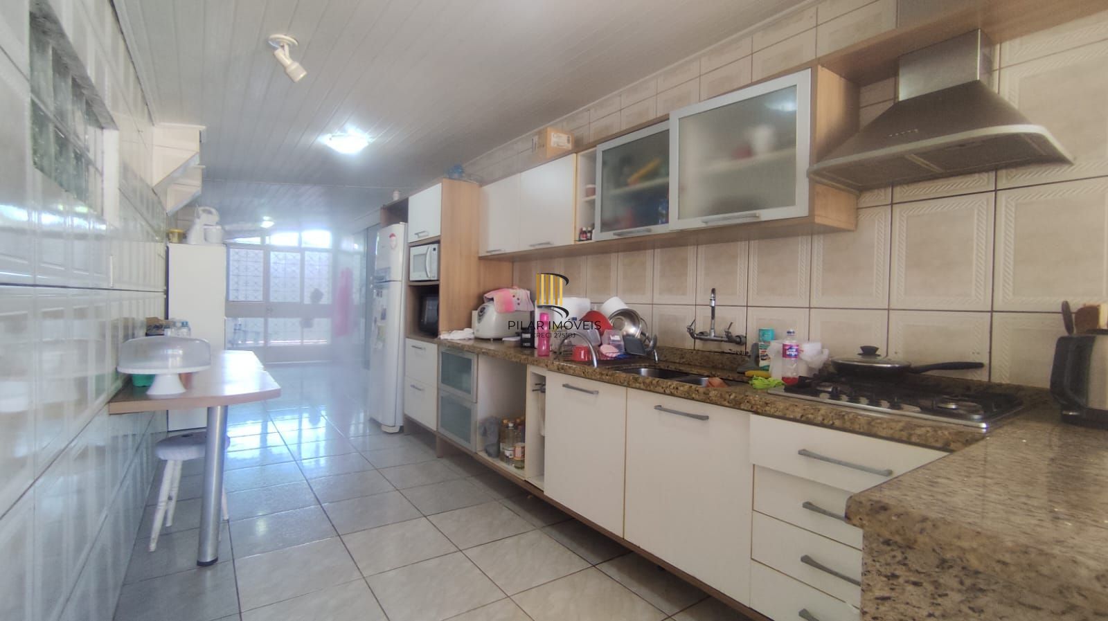 Casa térrea de 3 quartos, suíte, 3 vagas no bairro Santa Fé